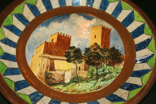 antiquariato: Piatto in ceramica decorata, con castello