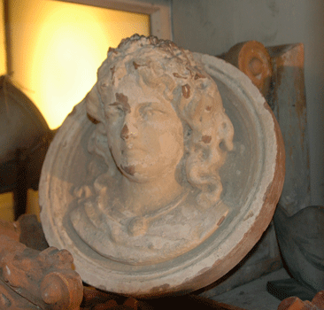 antiquariato: Terracotta round face