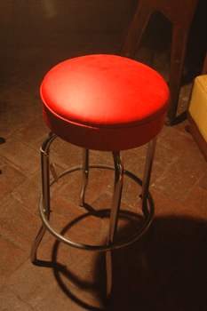 Iron stool with red leather