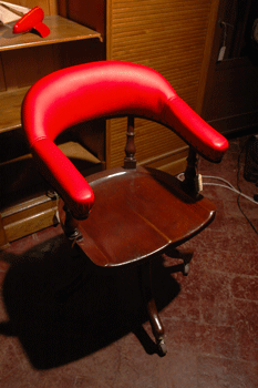 Oak armchair, with red leather