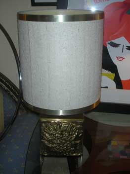 Metal lamp, with decoration on the base