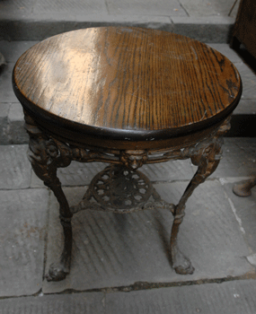 Cast iron table with wood on the top